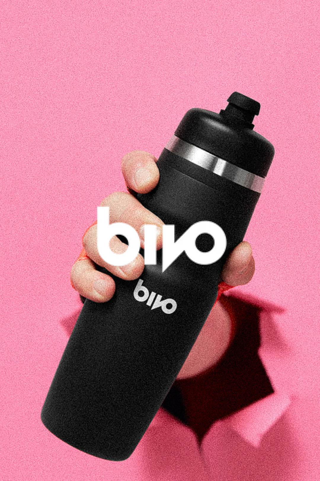 Hand holding a sleek Bivo water bottle, with a focus on hydration and style @ Bici.